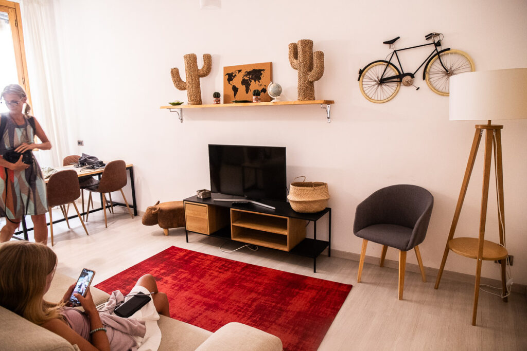 Girl sitting on a couch in an apartment