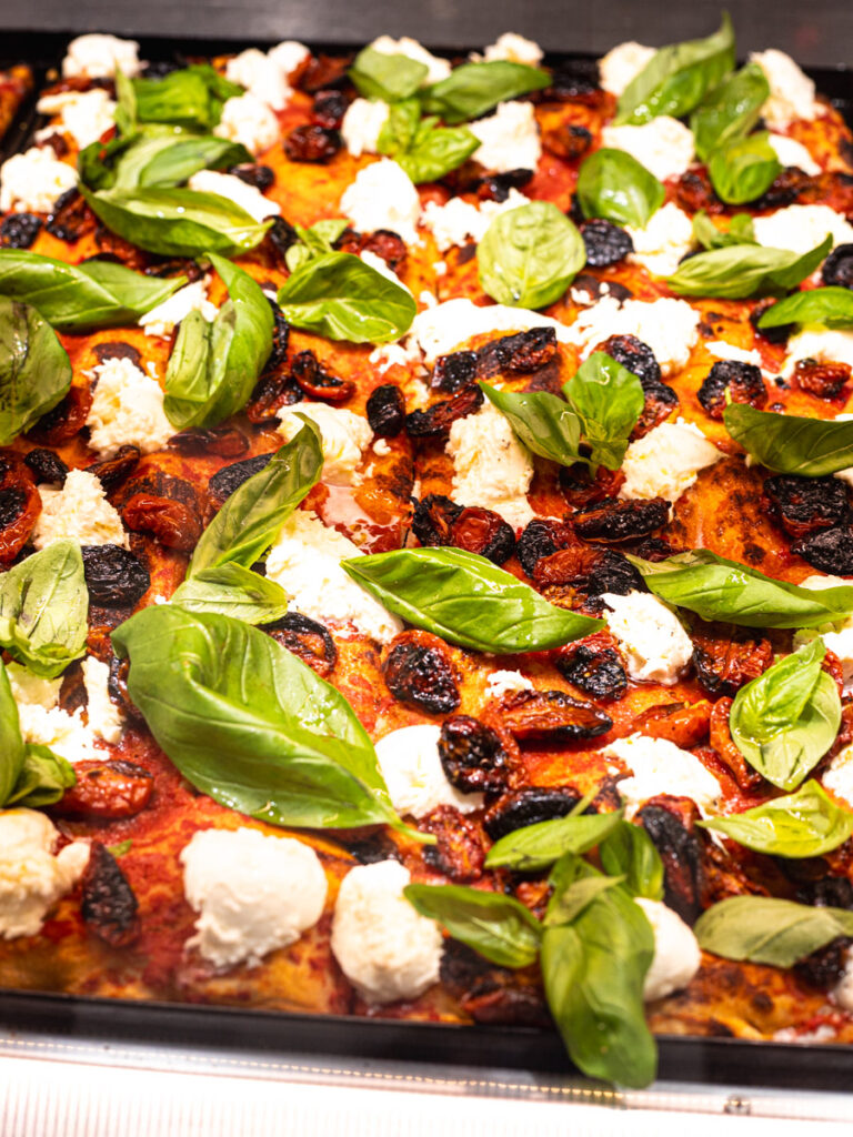 basil and mozzarella pizza