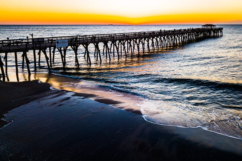 Sunrise over jetty at Myrtle Beach State park, 