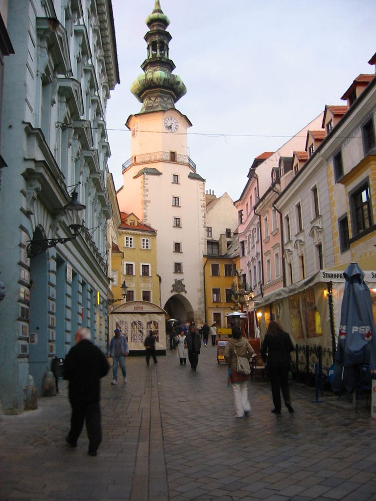 people walking along street in pague