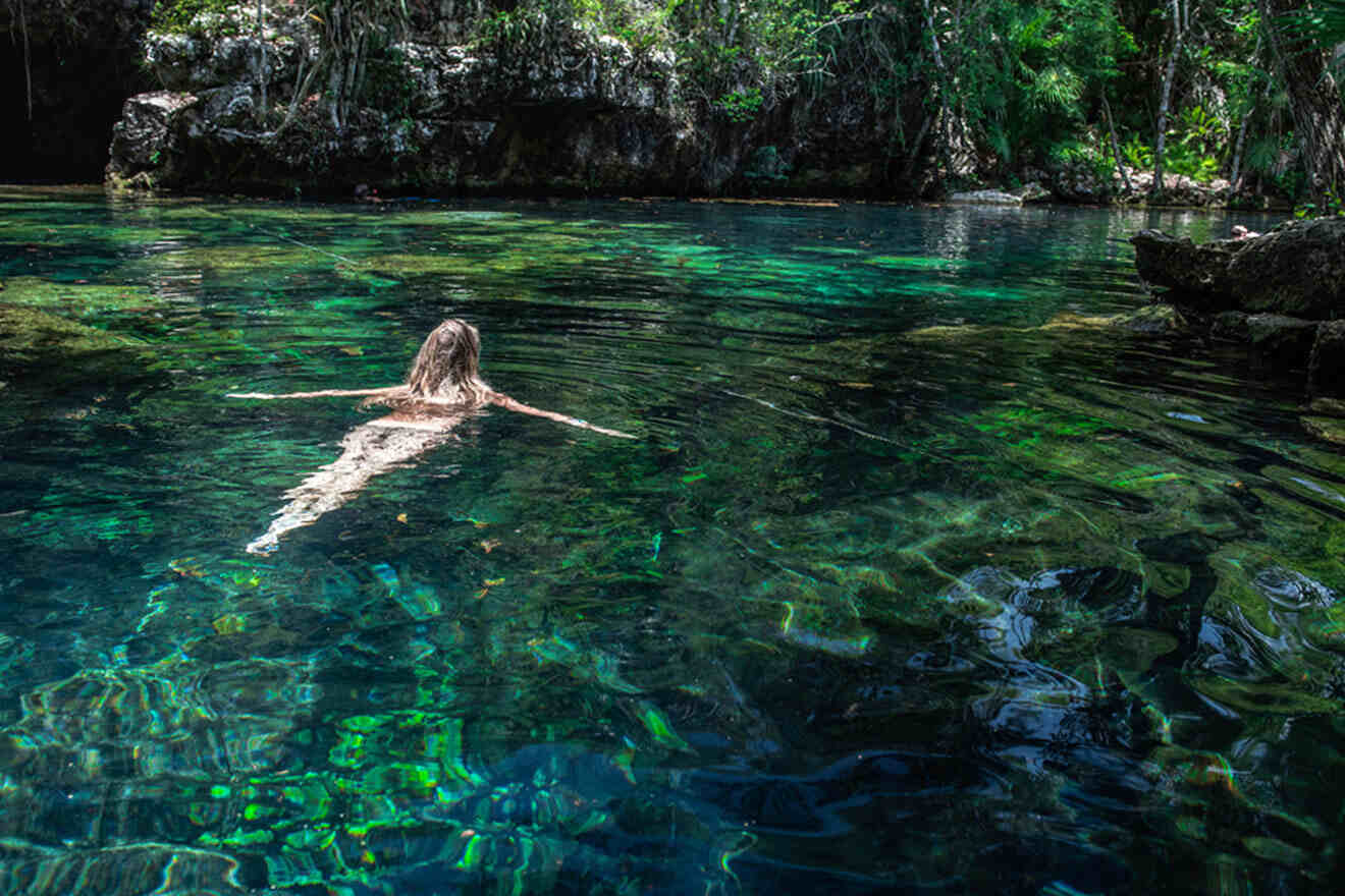 a person swimming in a body of water