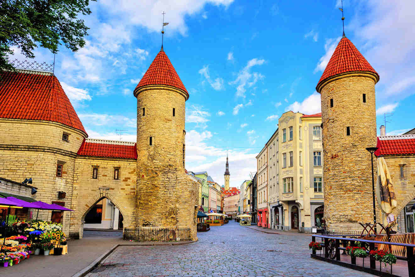 a cobblestone street lined with stone buildings