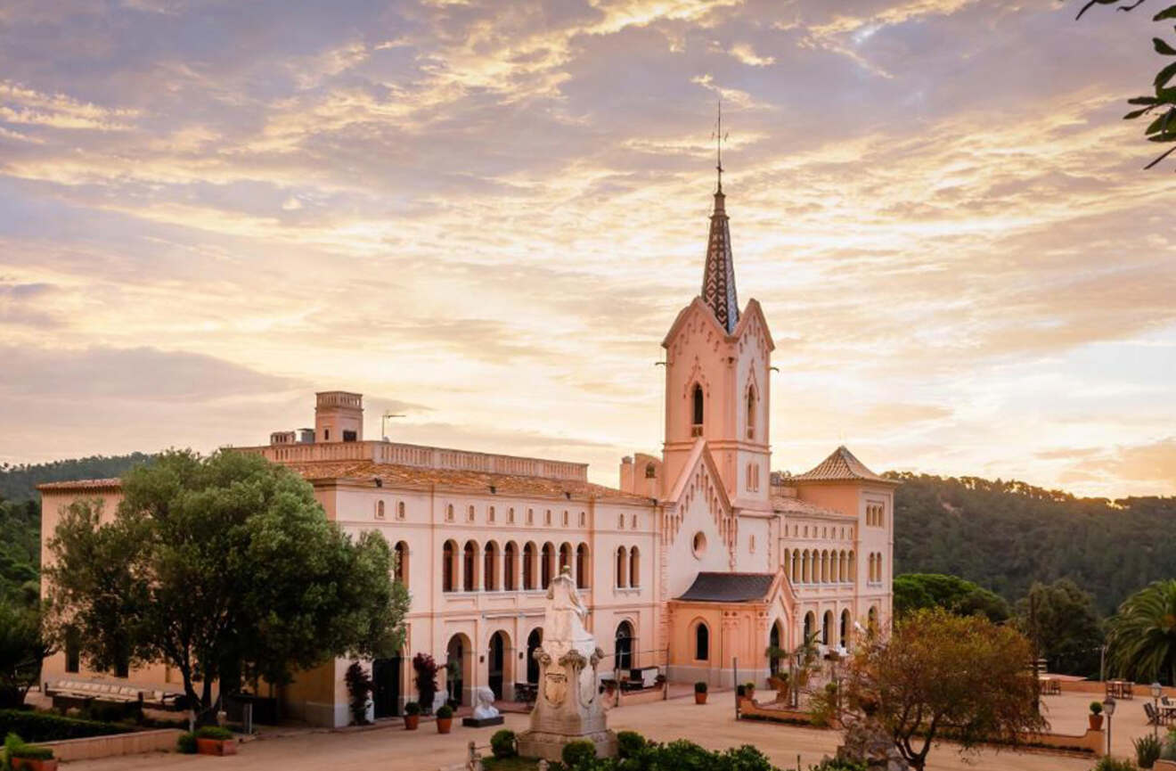 view of a hotel at sunset