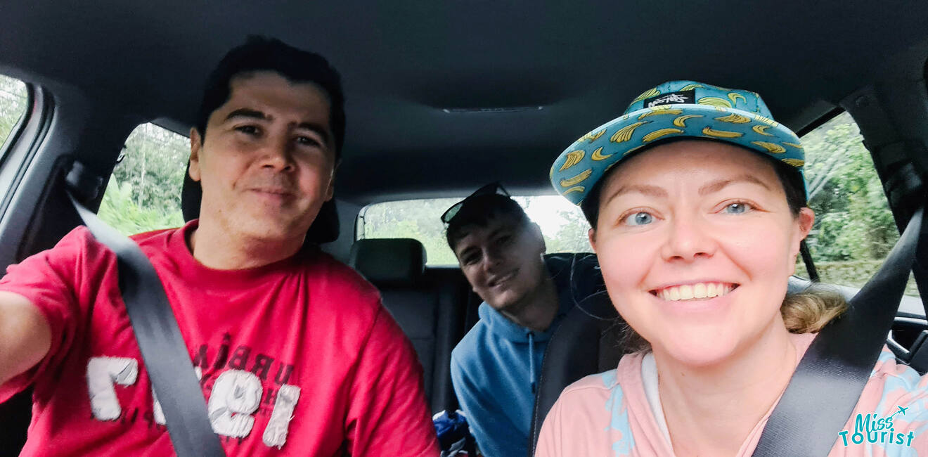 Three people sitting in the car.