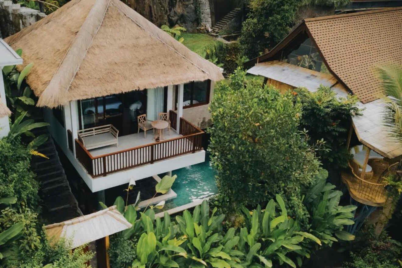 An aerial view of a house with a thatched roof.