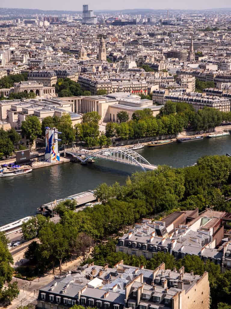 View over a river and city from top of Eiffel Tower