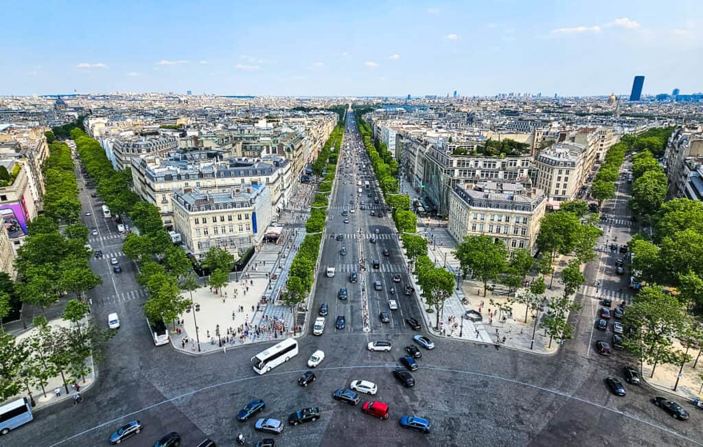 Three city streets lined with trees