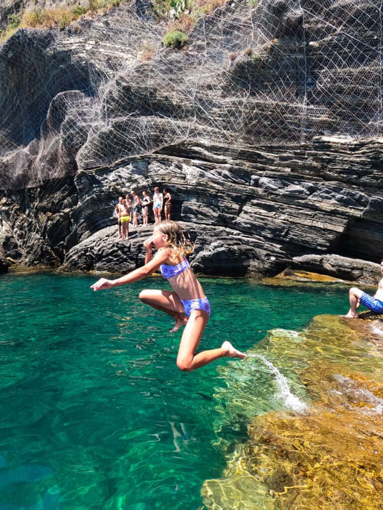 savannah jumping into the water