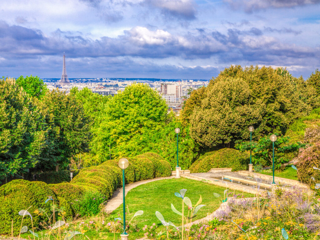 View of Paris cityscape with Eiffel Tower from park Belleville in east Paris