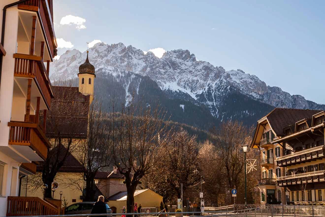 A town with a mountain in the background.