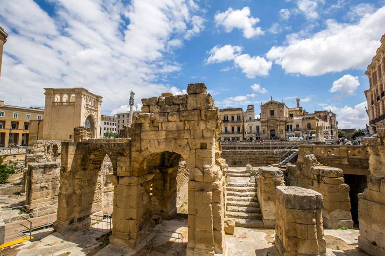 the ruins of a roman city under a blue sky