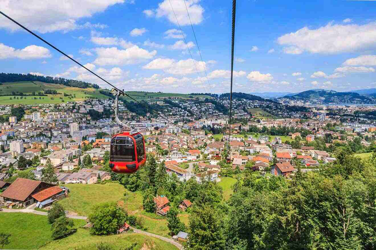 A gondola ride over a town in switzerland.