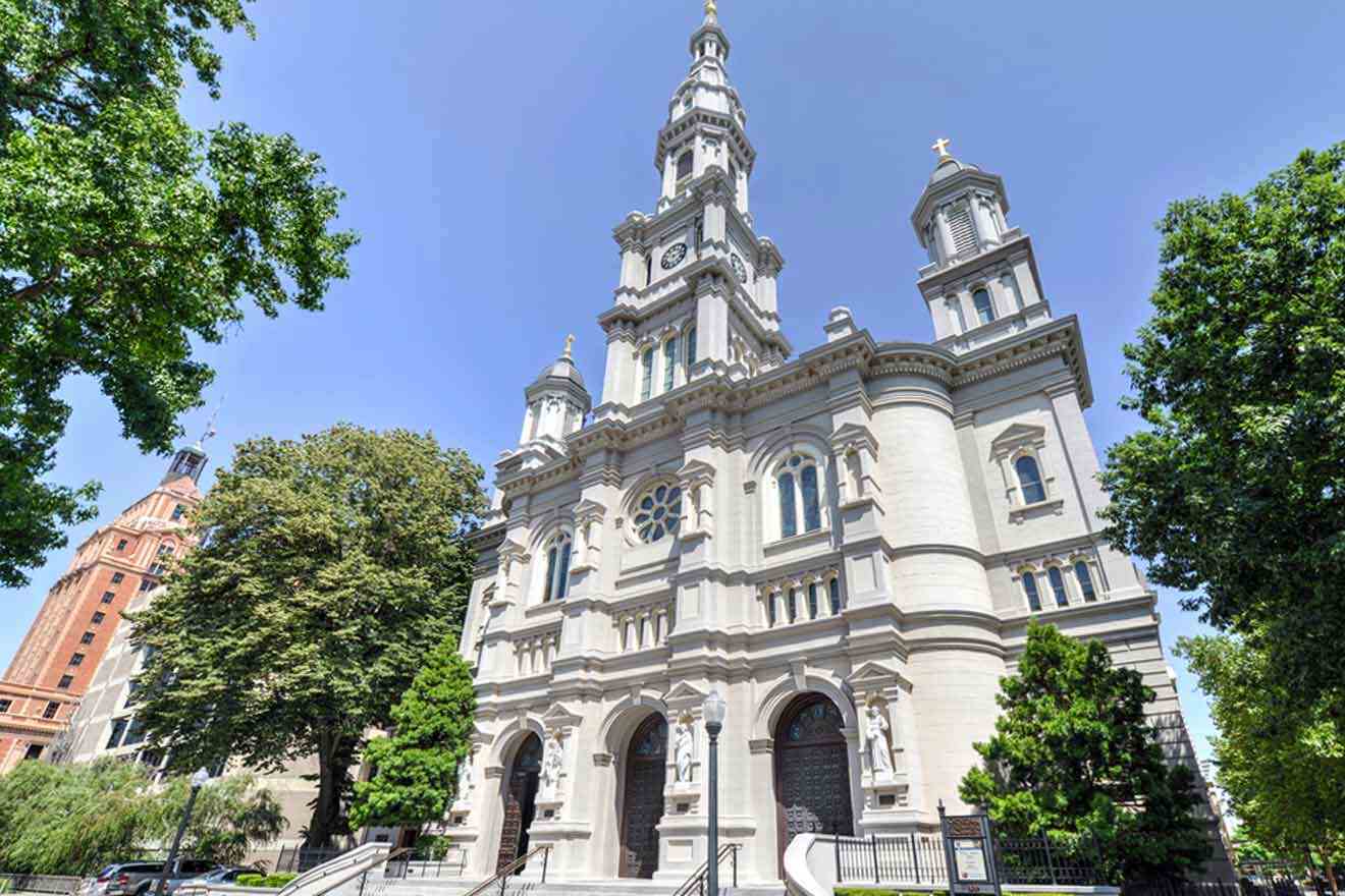 building of a cathedral with towers and trees in front of it