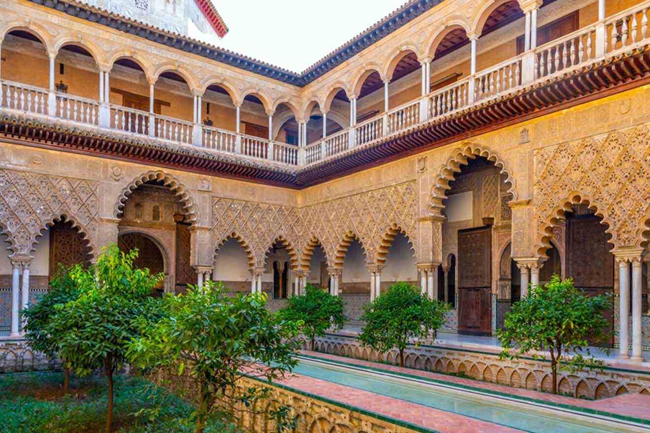 Alcázar of Seville with a pool and trees