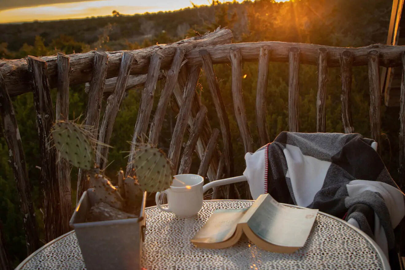 a table with a tea set and book