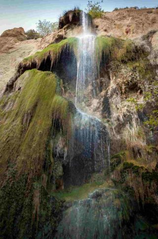 waterfall viewed from underneath it