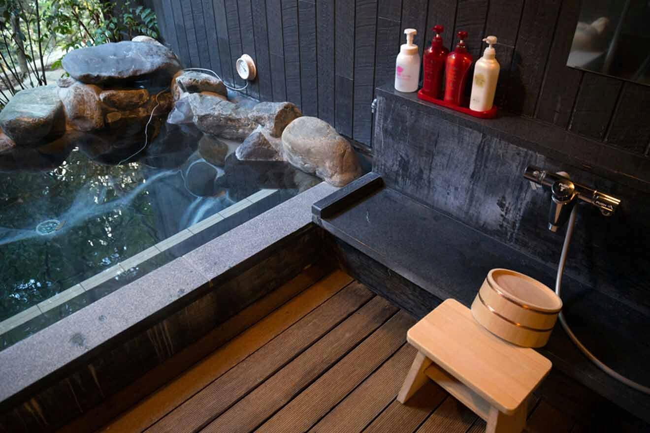 a bathroom with a large tub filled with water