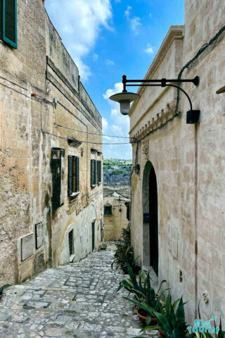 A narrow cobblestone street in an old town