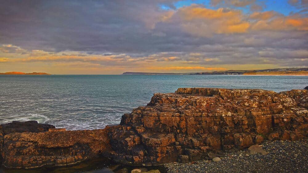 rocks on edge of water Portrush