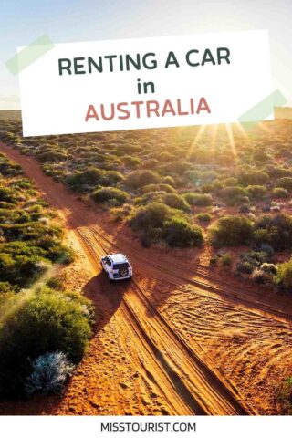 aerial shot of a car driving through the desert