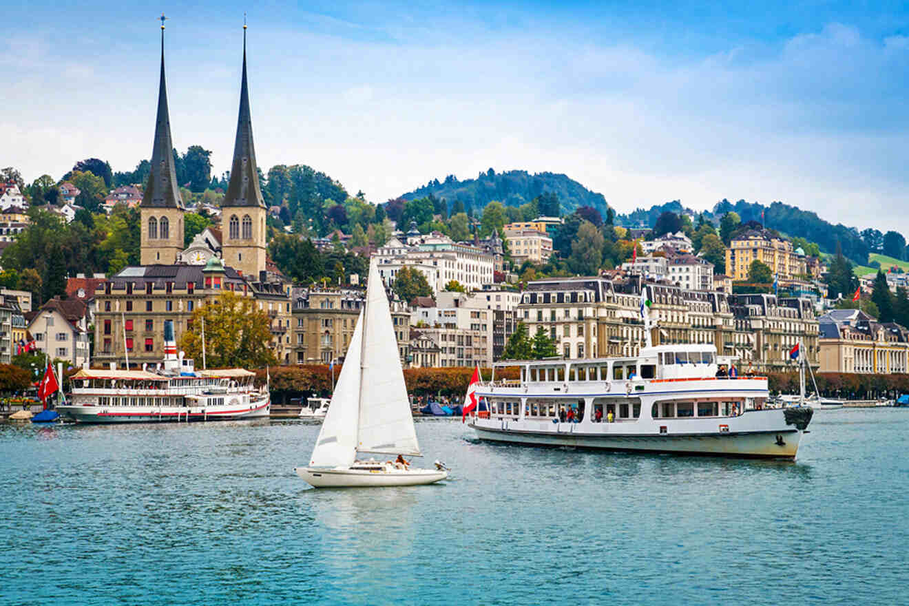 various boats with a city in the background