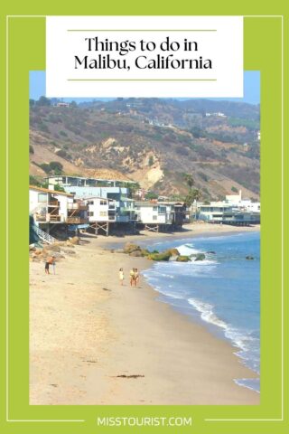 a picture of a beach with people walking on it and buildings in the background