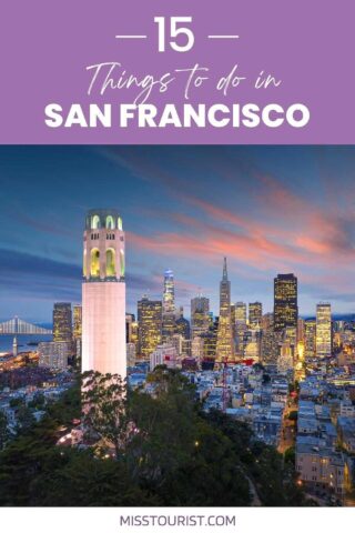 city skyline view with a focus of a lighted tower in the evening