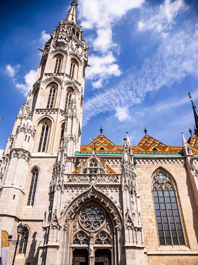 A cathedral with a blue sky background