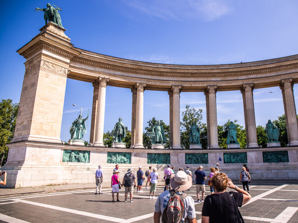 A circular monument in a city square