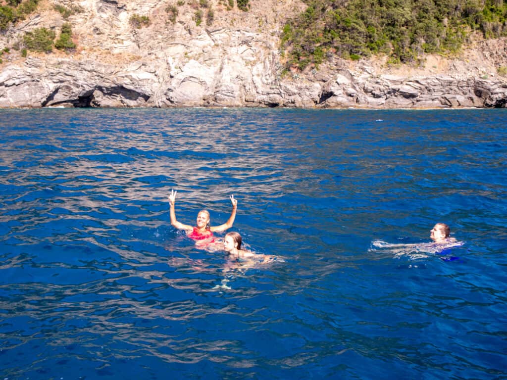 caroline and kalyra swimming in sea off shore