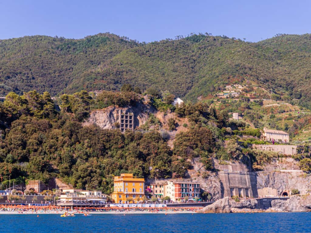 looking at monterosso beach and colored buildings from the ocean