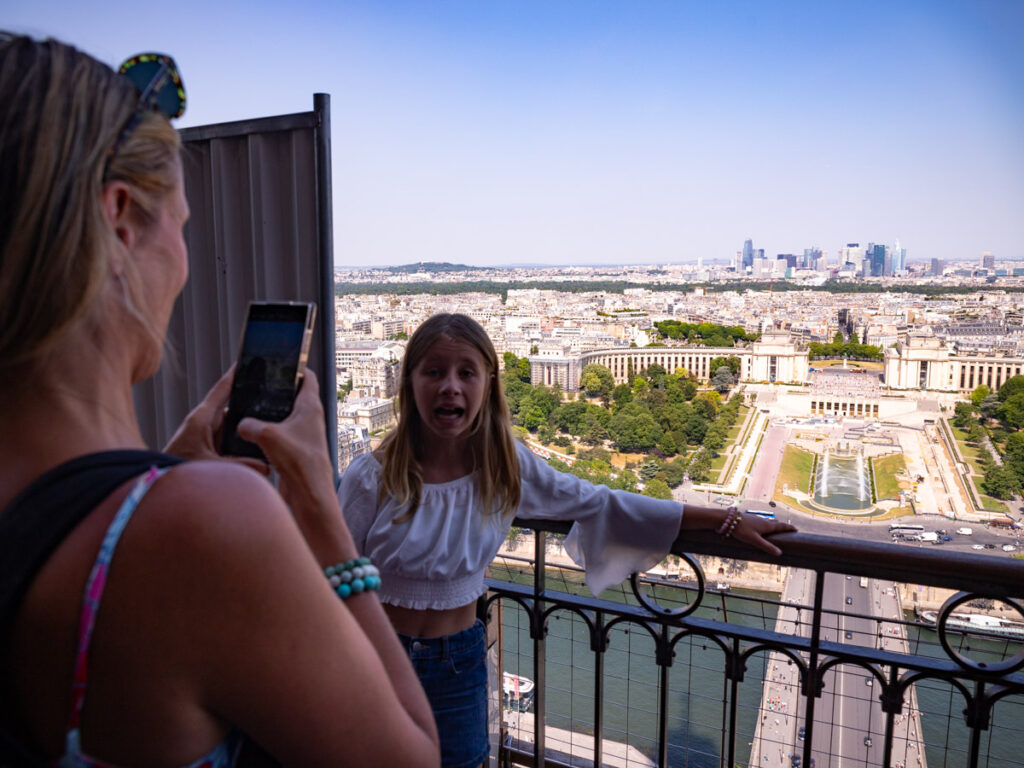 caz taking photos of savannah on eiffel tower