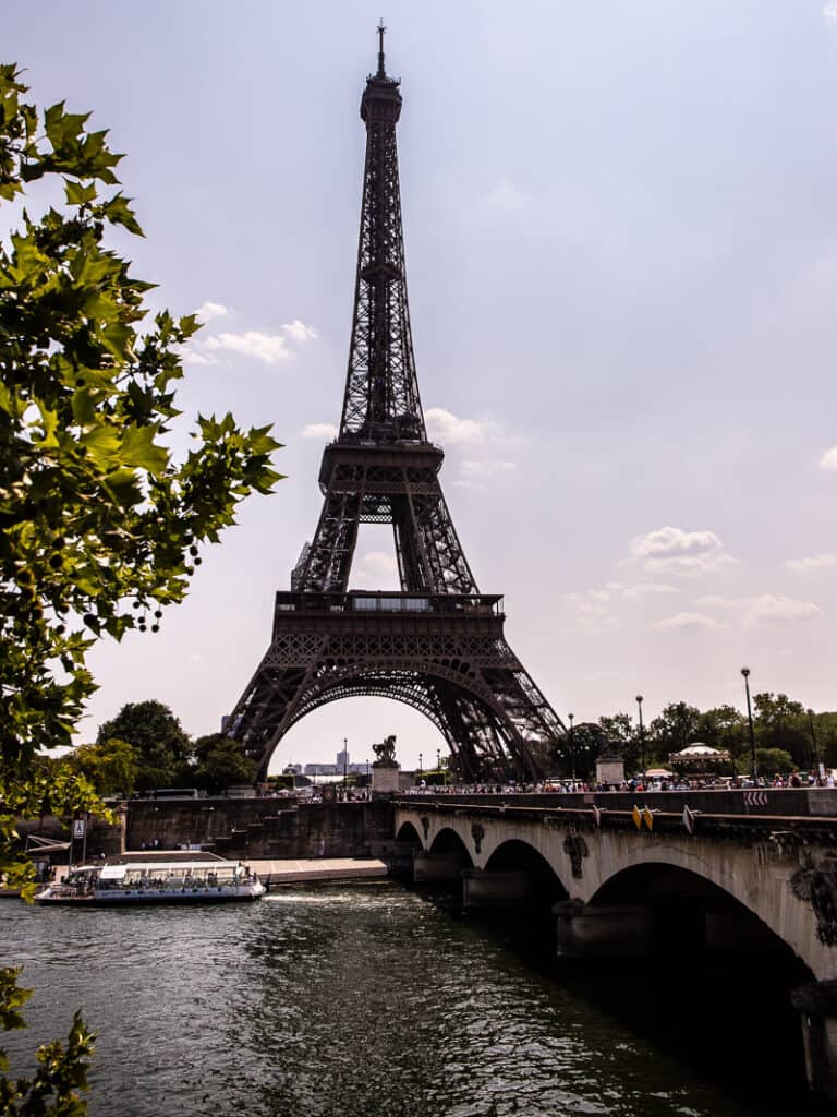 view of Eiffel tower on the edge of the seine river