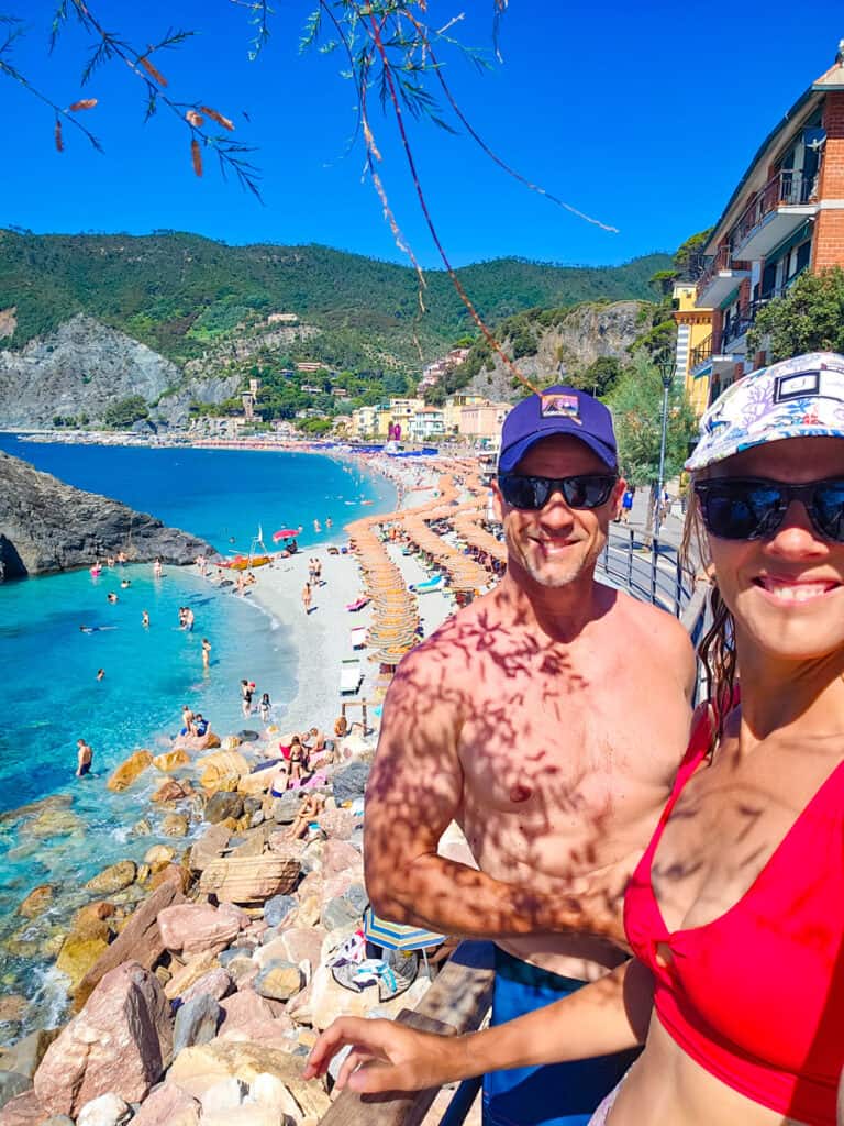 caz and craig standing at view overlooking beach