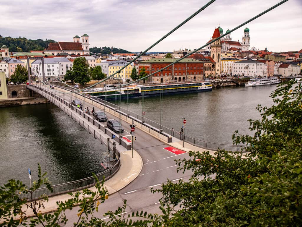 Cars crossing a cable bridge