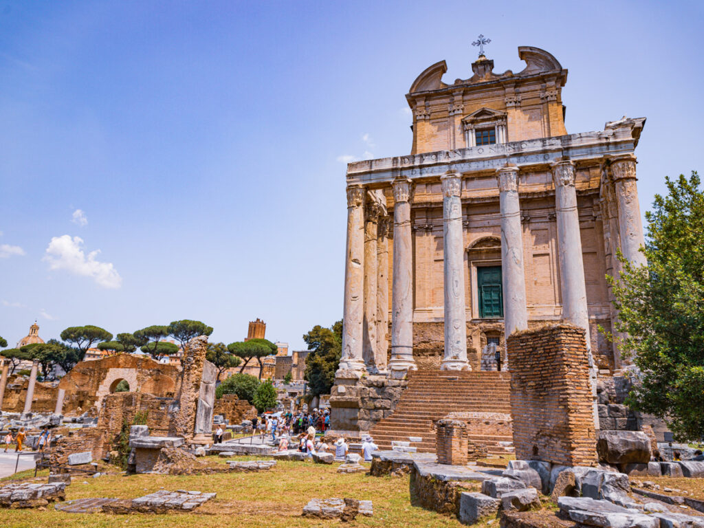 front of temple n the middle of roman ruins