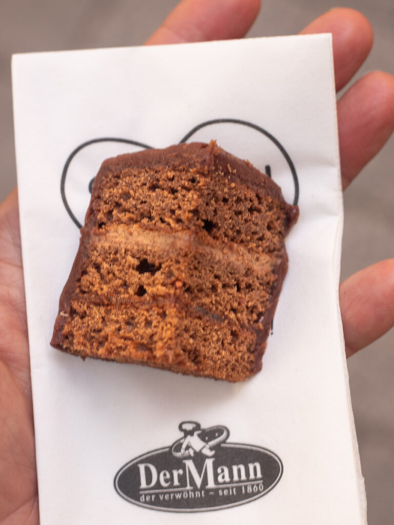 Piece of chocolate cake on a white napkin