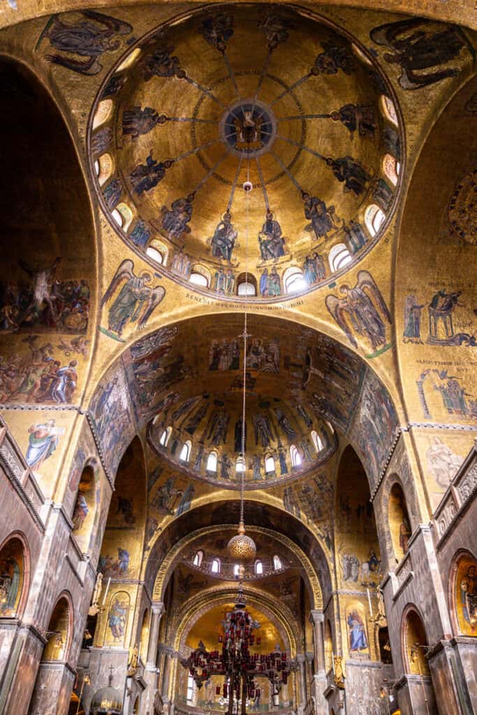 golden roofs and archways inside ST Mark's Basilica