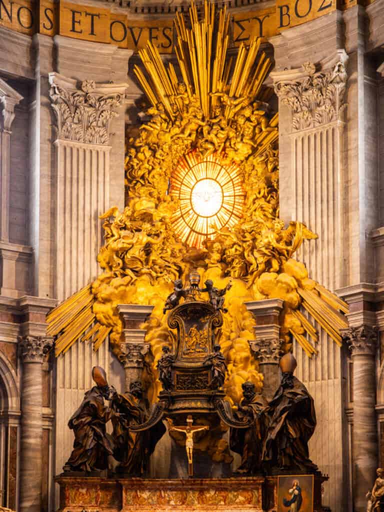 bronze statue and altar vatican