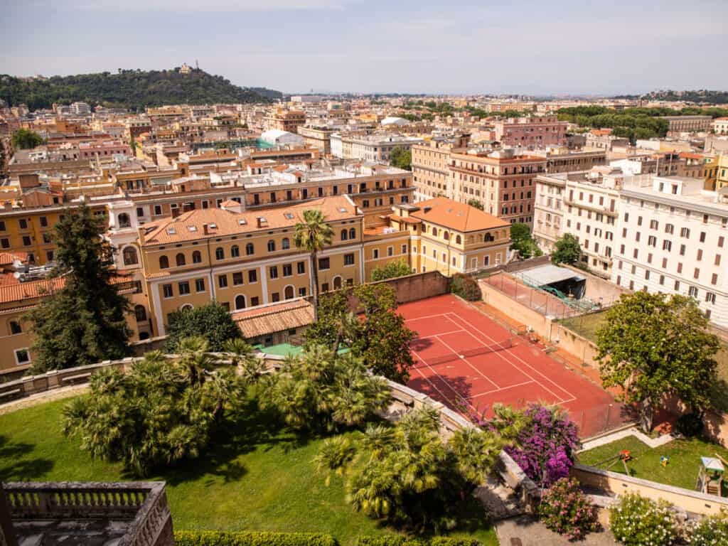 view overlooking rome and small hil from inside the vatican museum