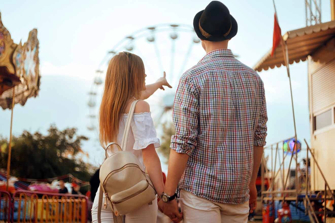 young couple in a theme park