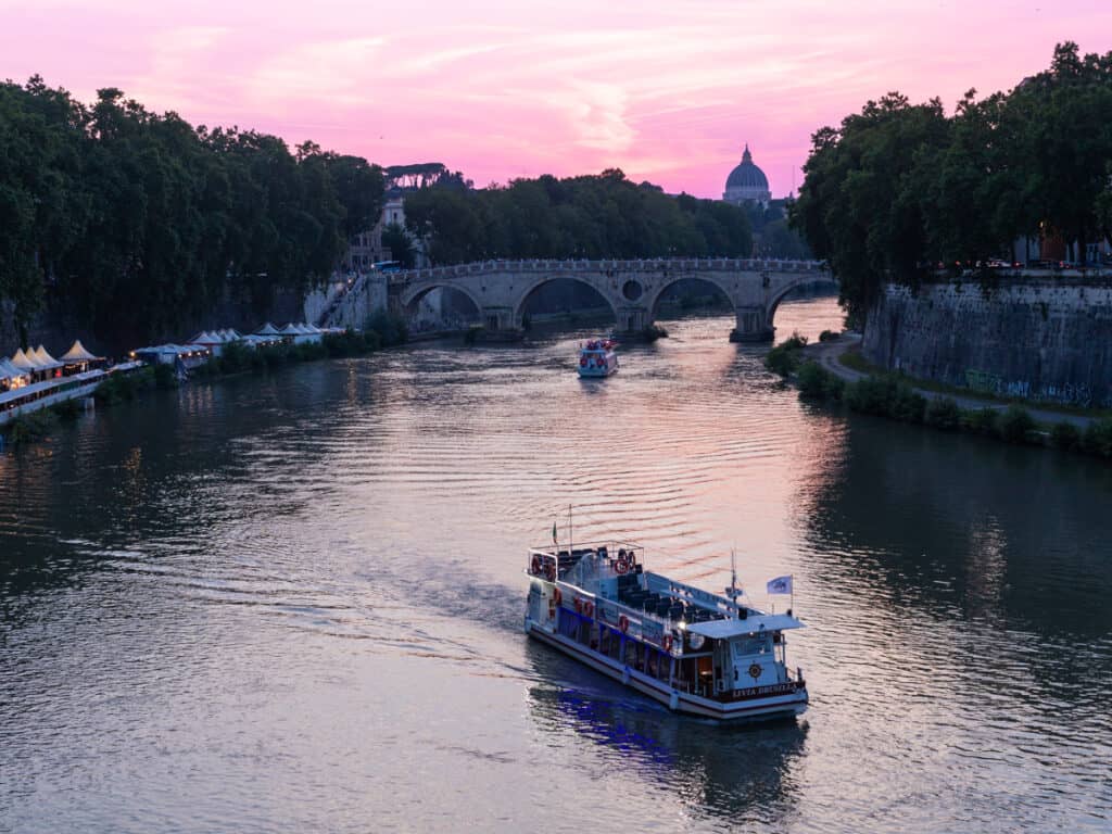 sunset over the Tiber river in Trastevere