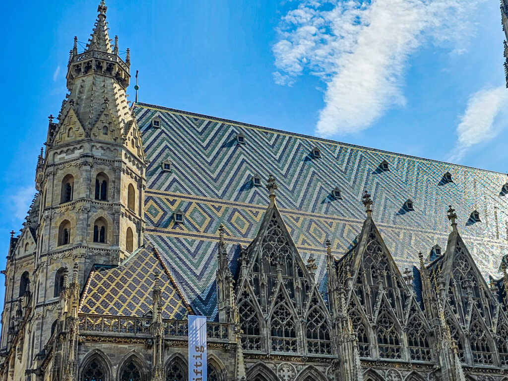 Cathedral spire and building in a city