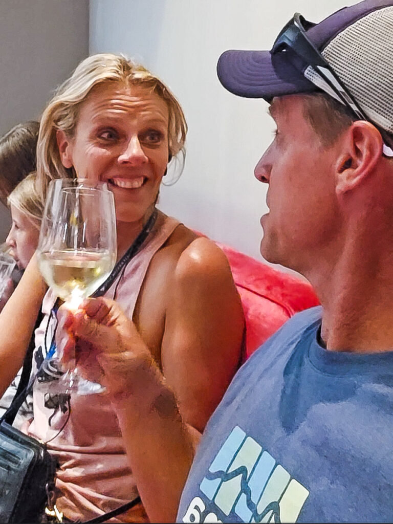 Man and woman drinking wine together