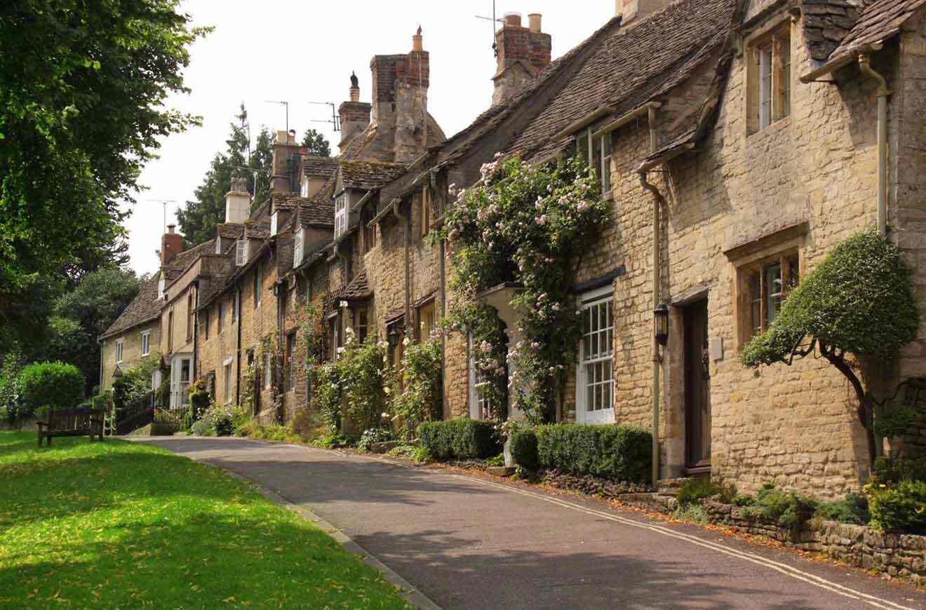 A row of stone houses on a street.