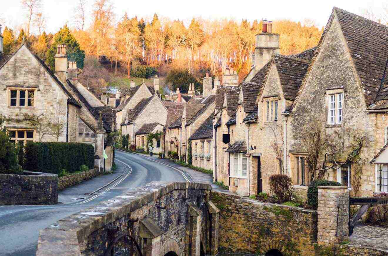 row of stone houses by a bridge