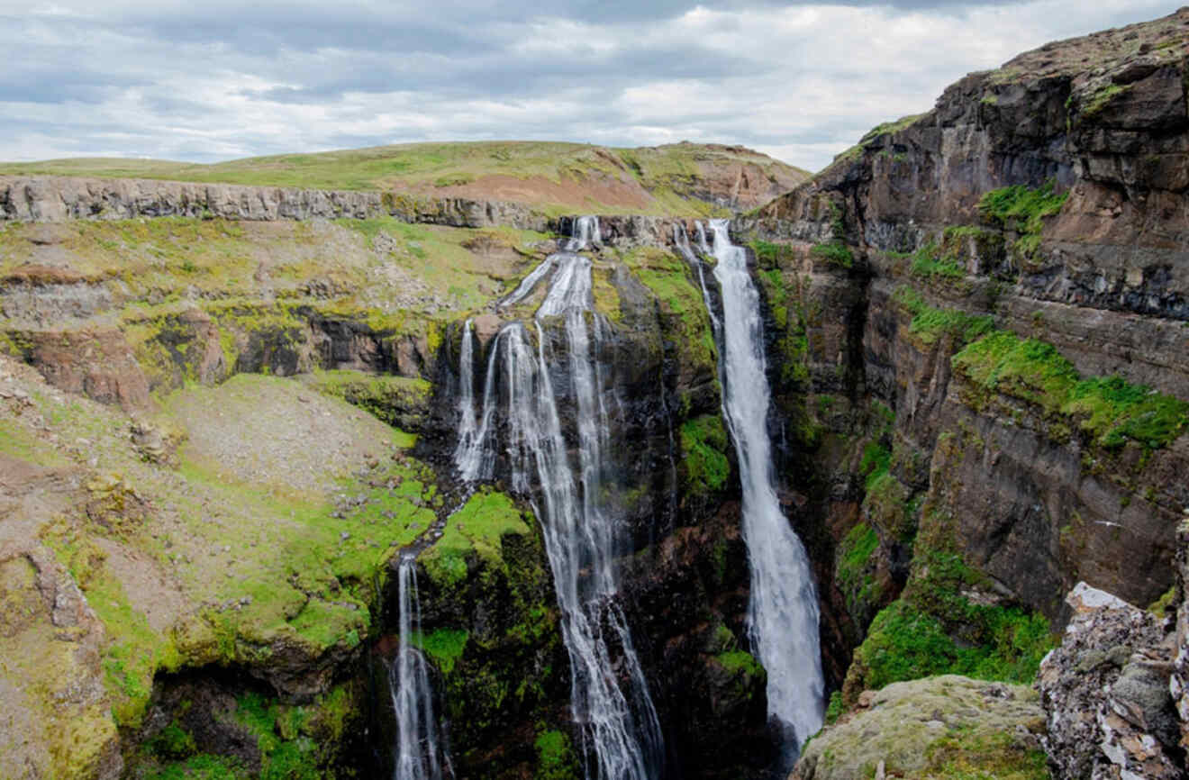 aerial view of very tall waterfalls on a mountain