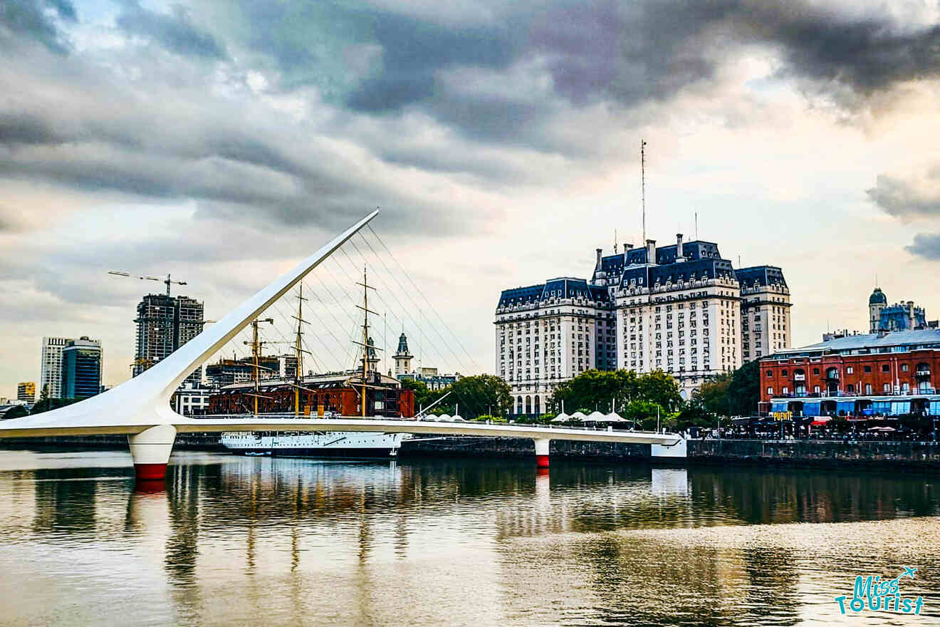 View of a bridge over a river and buildings on the bank