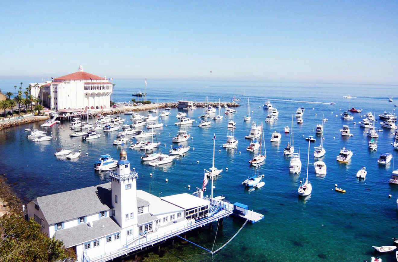 A harbor with many boats docked in the water.