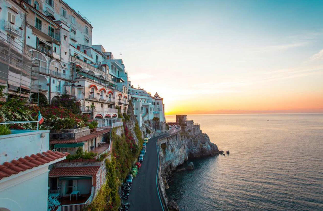 buildings on the coast at sunset